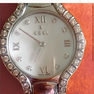 Ebel beluga 28 mm stainless steel case with 32 diamonds .75 carats
